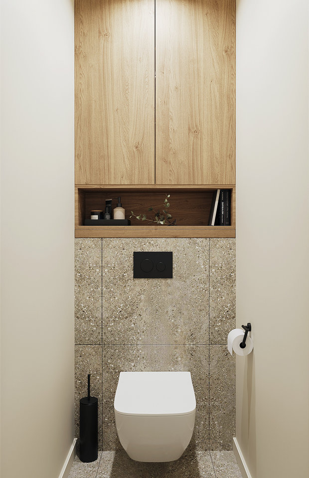 Санузел остался почти без изменений: добавили только шкаф над инсталляцией, в котором скрыты бойлер и коллекторный узел. Как в и душевой, в отделке использованы спокойные, теплые оттенки в сочетании текстур дерева и камня.