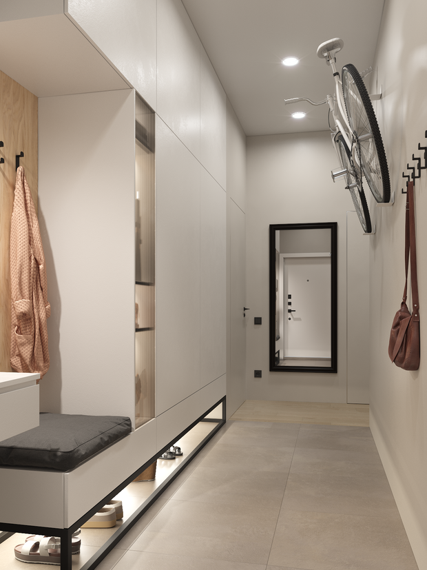 Чтобы визуально облегчить большой шкаф, его «поставили» на каркас черного цвета с подсветкой. Так будет легче находить нужную пару обуви.