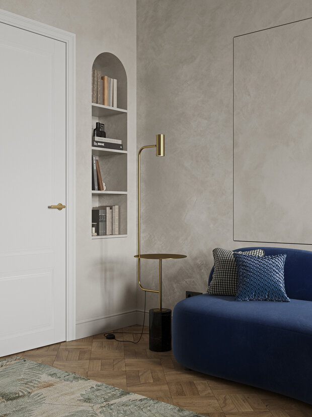 Дизайн построен на контрасте четкой геометрии и округлых форм, плавных линий. В гостиной диван работает как главная цветовая доминанта, привлекая внимание.