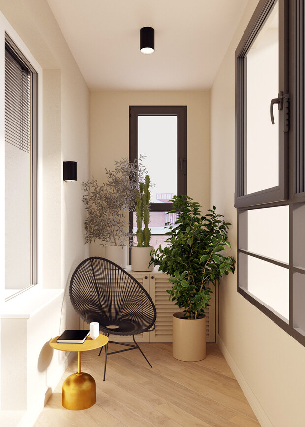 Тумбы с жалюзийными дверцами на лоджии сделаны на заказ. В одной спрятан внешний блок кондиционера, а в другом предусмотрено небольшое хранение.