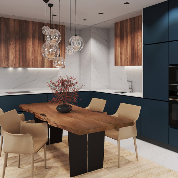 В отделке кухни комбинировали темные матовые фасады и шпон дерева. А пространство между ними выложили керамогранитом под мрамор.