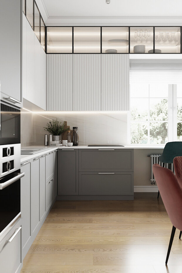 Вид из окон кухни открывается на сад, поэтому вдоль окна сделали полубарную стойку, ее можно использовать как продолжение рабочей поверхности или просто выпить за ней чашечку кофе с утра.