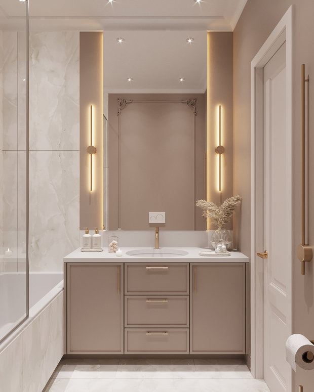 В ванной комнате в отделке сочетали керамогранит, краску и гипсовую лепнину.