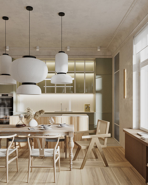 Зонирование потребовалось только в кухне-гостиной. Главный герой кухни — винтажный стол из дуба с дизайнерскими стульями. Он — сердце квартиры. Рядом — остров в отделке из шпона.