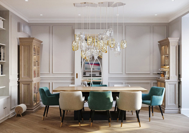 Сдвижная дверь с зеркальной поверхностью и необычным рисунком филенок будет выполнена под заказ на столярном производстве при студии, как и массивные буфет и сервант по бокам помещения. 