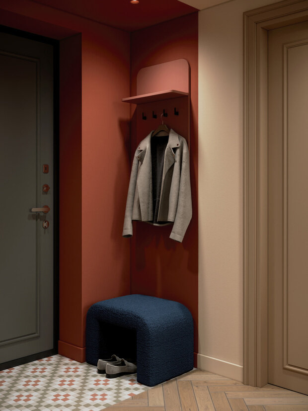 Входная зона компактная, но функциональная: здесь есть открытая вешалка, пуфик, на который можно присесть, напротив зеркальный фасад шкафа, чтобы посмотреть на себя перед выходом из дома.