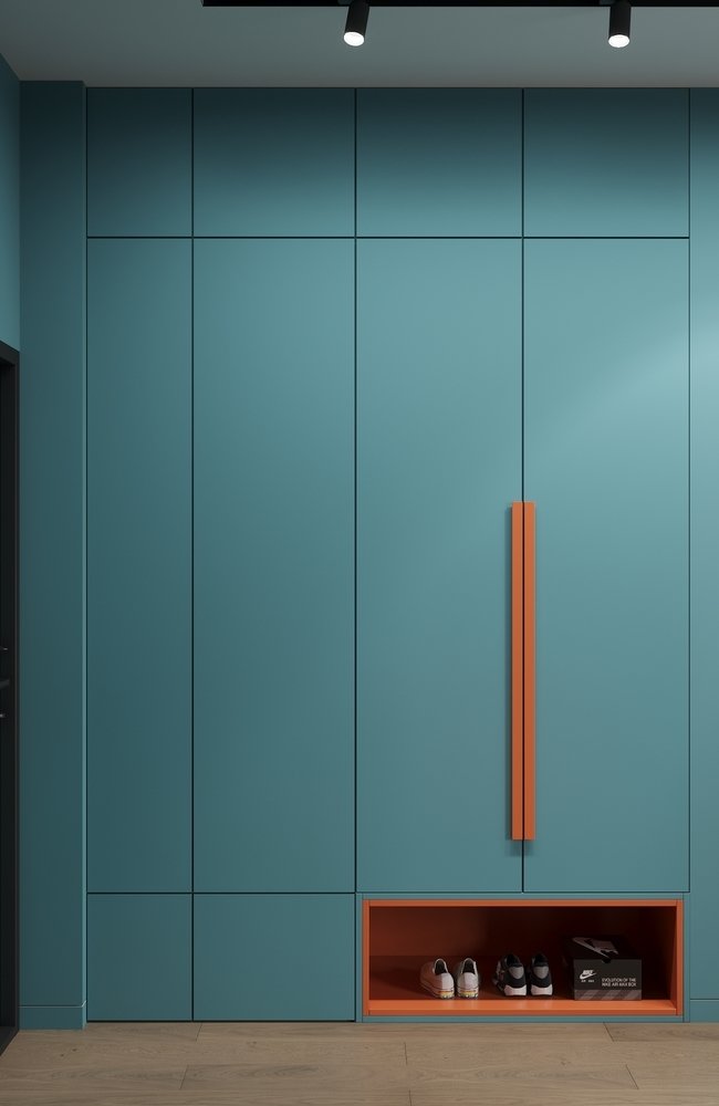 Яркий коридор — фишка проекта. Выделили его цветом и продолжили мебельной панелью с перфорацией. Сочным акцентом стала теплая оранжевая тумба. Яркий коридор — фишка проекта. Выделили его цветом и продолжили мебельной панелью с перфорацией. Сочным акцентом стала теплая оранжевая тумба.