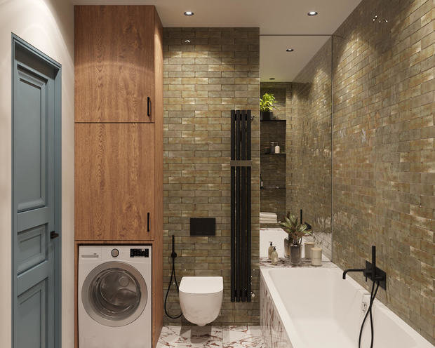 Заказчица любит принимать ванну, поэтому во втором санузле предусмотрели ванну с центральным сливом, большим количеством полочек и зеркалом.