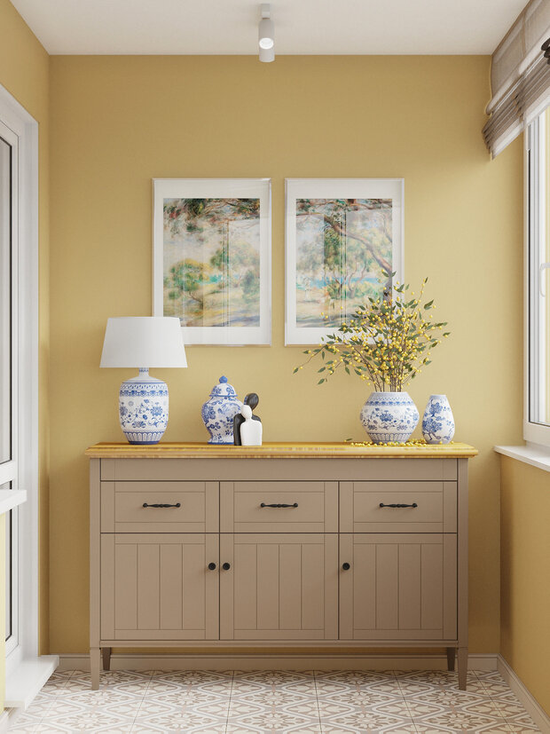 На лоджии, граничащей со столовой, организовали рабочее место, а также поставили комод для хранения. 