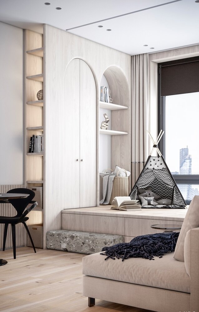 Система хранения симметрично делится на две арки. В секции ближе к окну в дальнейшем разместится письменный стол для мальчика.