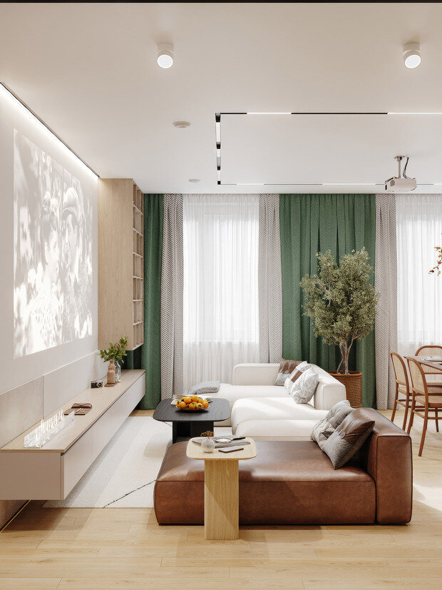 Диванная группа состоит из углового дивана в текстильной обивке и козетки в кожаной, а также журнального столика из темного дерева.