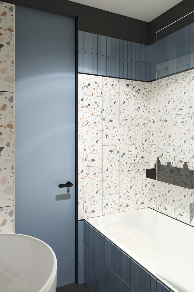 В качестве отделки санузлов в общей зоне выбрали керамогранит и плитку одного производителя, но разных цветов, чтобы плитка на фартуке кухни перекликалась с плиткой в санузле и на полу.