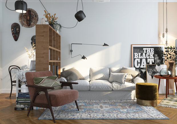 Зонирование в гостиной выполнили с помощью стеллажа и ковра.