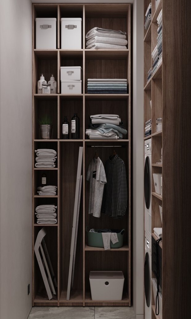 В постирочной продумана система для хранения хозинвентаря, там же будут располагаться стиральная и сушильная машины в колонне, а рядом разместится шкаф для хранения.