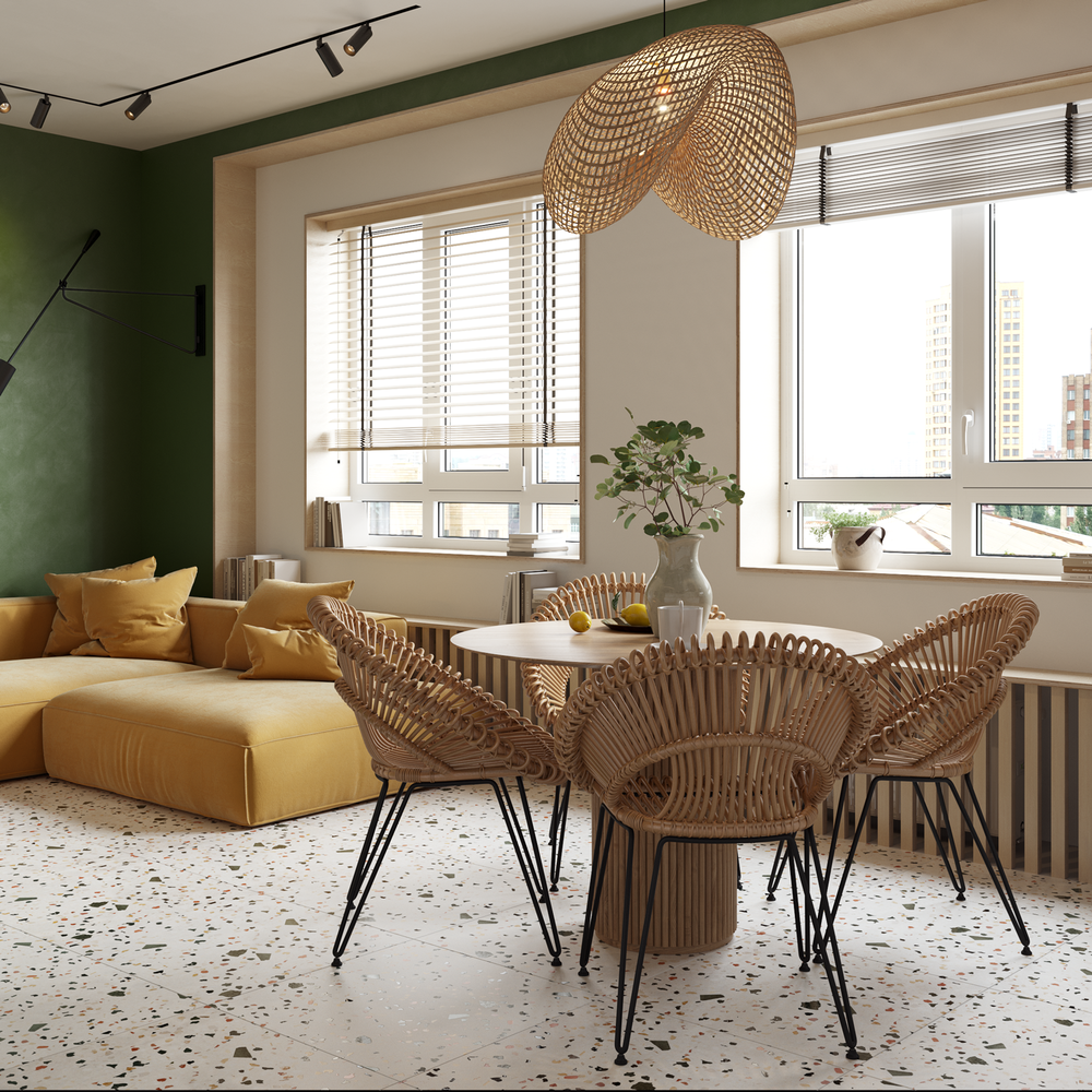 Зона окон, подоконников и настенных панелей оформлена фанерой под лаком, на стенах использовали краску, на пол положили керамогранит Terazzo.